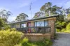 NEAT & LIGHT-FILLED BRICK HOME WITH FUTURE POTENTIAL