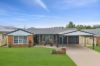 Beautiful single level home designed with multiple living and dining zones
