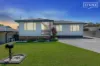 North-facing backyard, pool & abundant garaging