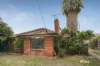 Classic Mid-Century Charm With North-Rear Potential