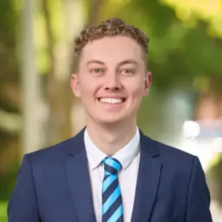 Elliott  Cooper - Real Estate Agent
