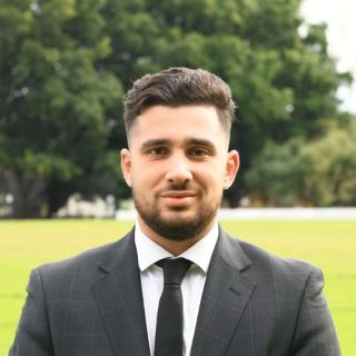 John Combis - Real Estate Agent