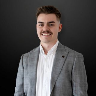Caleb Scharvi - Real Estate Agent