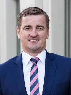 Damien Theisz - Real Estate Agent