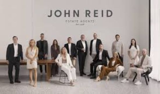 John Reid Real Estate - Broadbeach Waters - Real Estate Agency