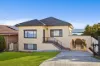 18 St Cloud Crescent, Lake Heights, NSW 2502