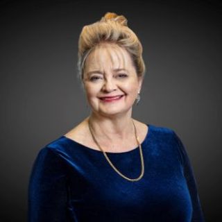 Adrienne Robinson - Real Estate Agent