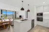 North West facing Corner Apartment with 2 Car Spaces & Spectacular Sunsets