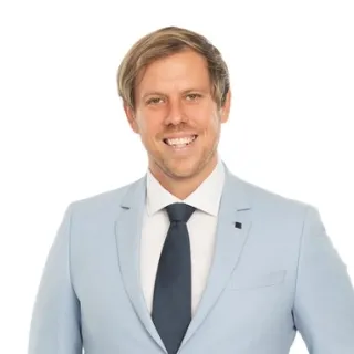 Sam  Holt - Real Estate Agent