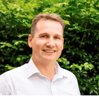 Adam Mangleson - Real Estate Agent