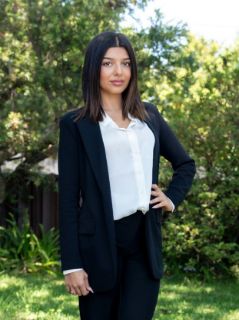 Malak Cuma - Real Estate Agent