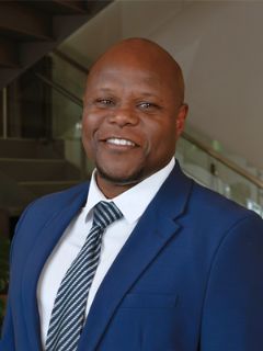 Martell Moore - Real Estate Agent
