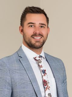 Ryan Evans - Real Estate Agent