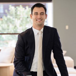Spiro Economy - Real Estate Agent