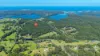 100 acres, lake frontage PLUS an airfield!