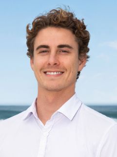 Tezu Harrison - Real Estate Agent
