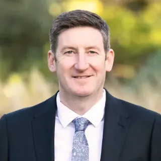 Travis Flint - Real Estate Agent