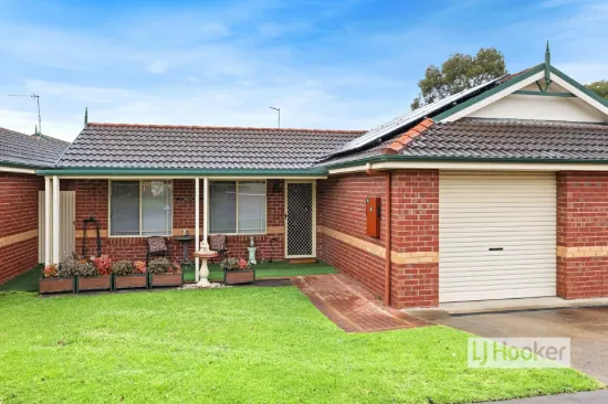 EASY CARE LIVING WITH SUNNY NORTH FACING COURTYARD IN PARKRIDGE VILLAGE