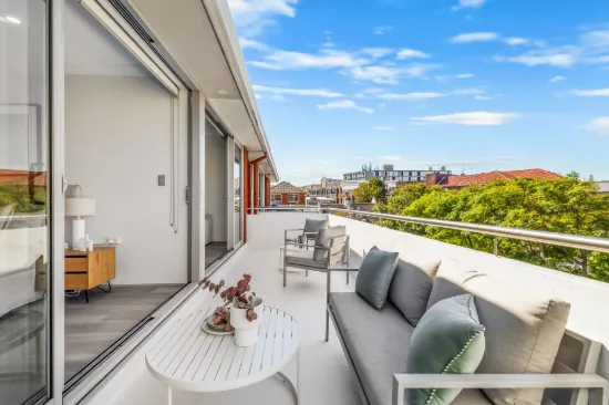 Refined Top-Floor Sanctuary Defined by Space, Light and Privacy