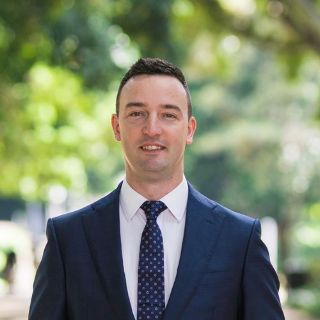 Tolga Ozer - Real Estate Agent